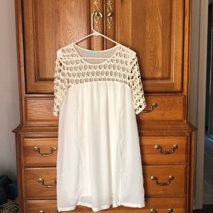 Off-white dress with scalloped lace